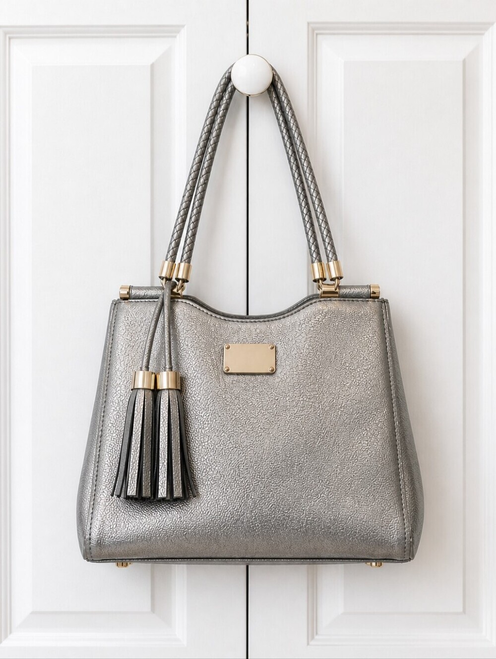 BEBE LEATHER Bag with Tassel Accents